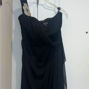 One sleeved formal gown